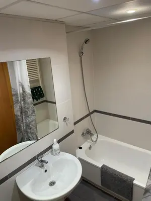 a bathroom with a sink and a bath tub at Valencia Sun House in Puebla de Farnals