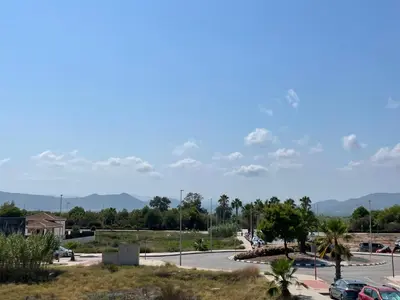 a view of a parking lot with mountains in the background at Almenara, primera linea de playa VT-45077-CS in Almenara
