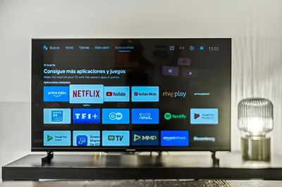 a flat screen tv sitting on top of a table at Moncofa Vistas Mar - Ideal Parejas in Moncófar