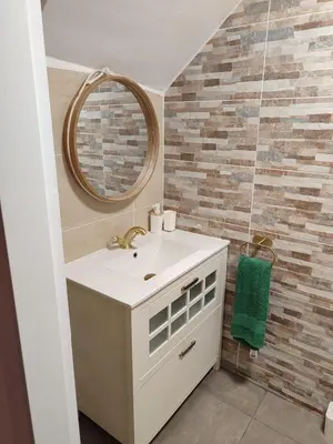 a bathroom with a sink and a mirror at Ca Salamandra in Albalat de Taronchers