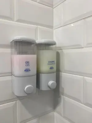 a wall with two containers of candles on it at ALZIRA BONiTA LES BARRAQUES 2PAX in Alzira