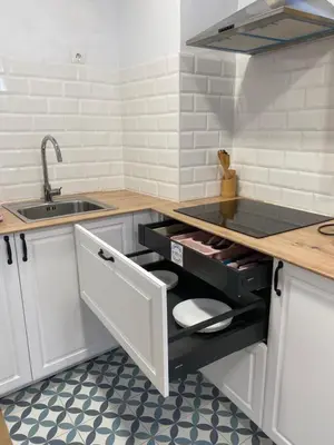 a kitchen with a sink and a counter top at ALZIRA BONiTA LES BARRAQUES 2PAX in Alzira