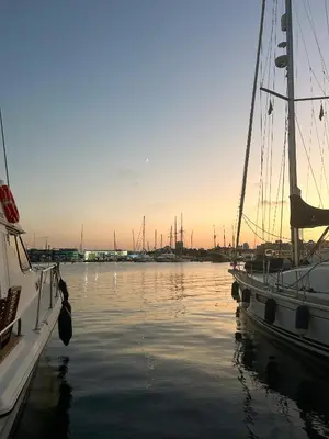 a couple of boats docked in a harbor at Barco muy espacioso con dos terrazas Valencia CENTRO!! in Valencia
