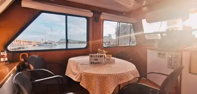 a dining room with a table and a window at Barco muy espacioso con dos terrazas Valencia CENTRO!! in Valencia