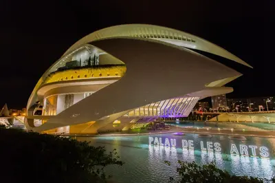 a view of a building at night at Cullera Horizon Apartment in Cullera