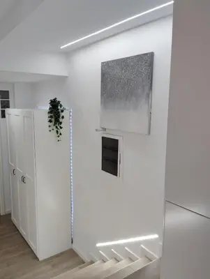 a white room with a door and a window at Apartamento Plaza Palmeras2 in Burjasot