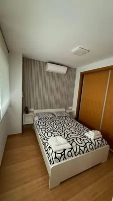 a bedroom with a large bed in a room at Apartamentos Felip 3 in Burriana