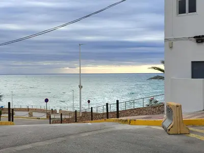 a view of the ocean from the side of a building at Seaviews Los Olivos in Cullera