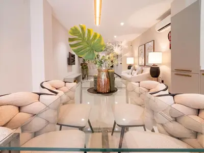 a salon with chairs and a glass table at MD Nou Mestalla in Valencia