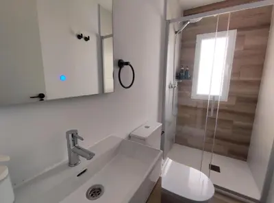 a bathroom with a sink and a toilet and a shower at Apartamento 3 Habitaciones 2 Baños in Puerto de Sagunto