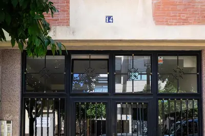 a store front with black doors and windows at SingularStays Padre Urbano in Valencia