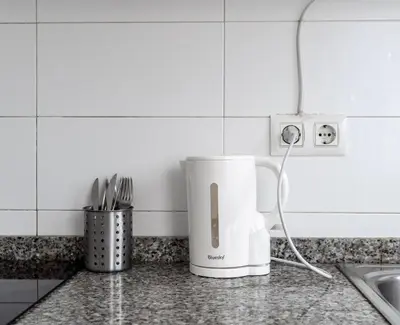 a coffeemaker sitting on a counter in a kitchen at Habitación Maritim 1 in Valencia
