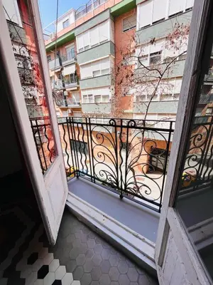 an open door to a balcony with a building at Habitacion Maritim 3 in Valencia