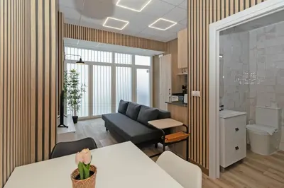 a living room with a couch and a table at GuestReady - Quaint Stay in Valencia in Valencia
