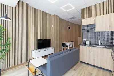 a living room with a couch and a tv at GuestReady - Delightful Valencian Stay in Valencia