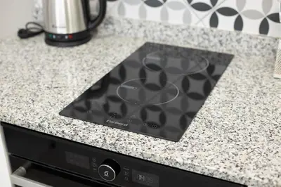 a stove top oven sitting on top of a counter at NEW BEACH Flats Valencia 2 in Valencia