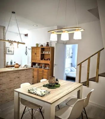 a dining room table and chairs in a kitchen at Casa Fina in Anna