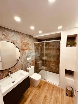 a bathroom with a sink and a toilet and a shower at LOFT Accommodative B in Valencia