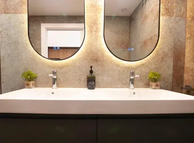 a bathroom with a sink and a mirror at LOFT Accommodative A in Valencia