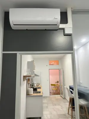 a view of a kitchen and a room with a heater at Mediterranéo in Valencia