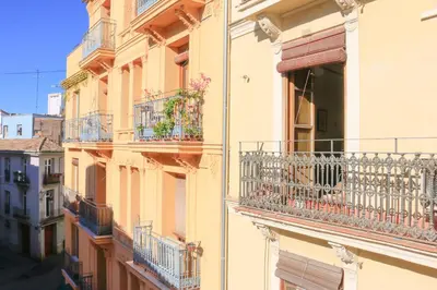 an image of a building with balconies and flowers at BET Apartments - Tramontana Apartments in Valencia