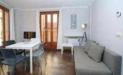a living room with a couch and a table at BET Apartments - Tramontana Apartments in Valencia