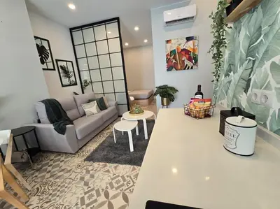 a living room with a couch and a table at Apartment Teo in El Carmen in Valencia