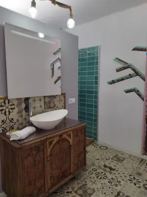 a bathroom with a sink and a mirror at rural relax Valencia in Villar del Arzobispo
