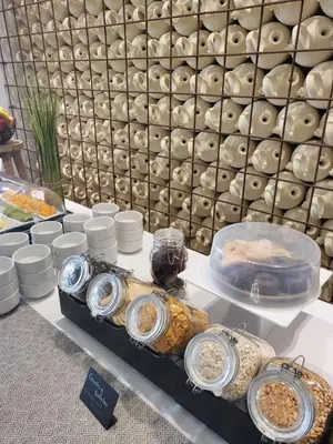 a display of food on a table in a store at Hotel Boutique Balandret in Valencia