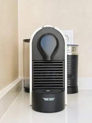 a toaster sitting on top of a kitchen counter at NUEVO, a 90 metros de la playa y con vistas al mar in Cullera