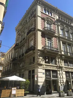 a large building on the corner of a street at L'Esplai Valencia in Valencia