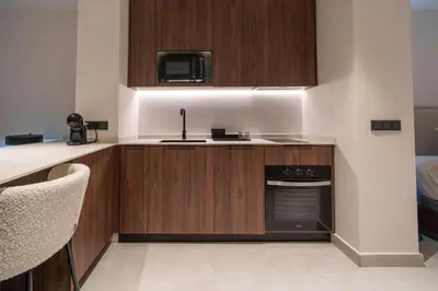 a kitchen with a sink and a stove at VLC HOST - Luz Casanova in Valencia
