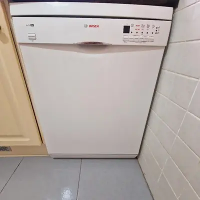 a dish washer and dryer in a kitchen at Chalet Playa Chilches in Chilches