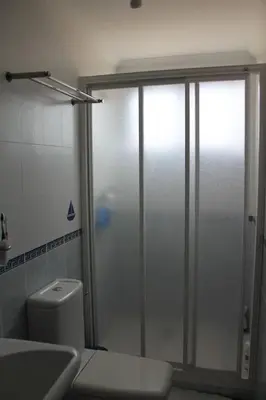 a bathroom with a shower with a toilet and a sink at La Casa del Olivo en Montserrat - Valencia in Valencia