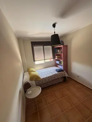 a small bedroom with a bed and a window at La Casa del Olivo en Montserrat - Valencia in Valencia