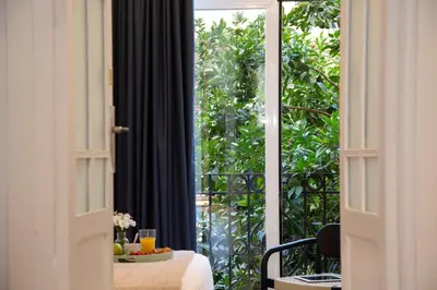 a view of a room with a table and a window at SingularStays Ca Iconic in Valencia