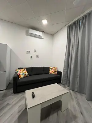 a living room with a couch and a coffee table at Gran loft - A in Valencia