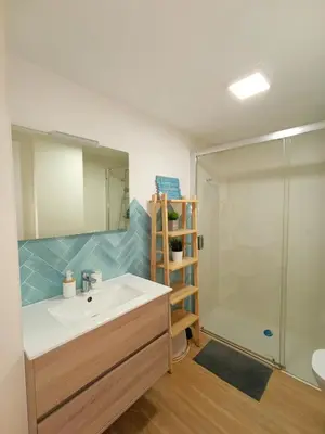 a bathroom with a sink and a shower at Play-Puig Beach Flat in El Puig