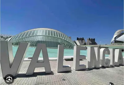 a sign in front of a glass building at Ruzafa experience Oceanografic ciencias in Valencia