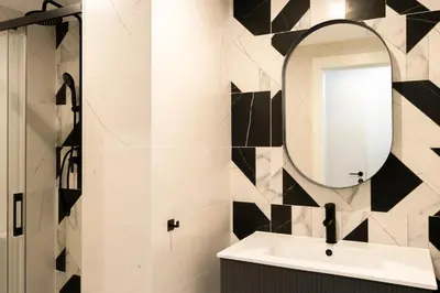 a bathroom with a sink and a mirror at Forata lofts in Valencia