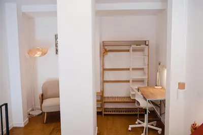 a room with a desk and a bed and a room with a desk at Lofts plaza JM Orense B in Valencia