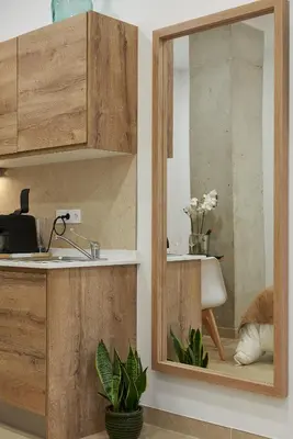 a kitchen with a sink and a mirror at Loft 9 in Valencia