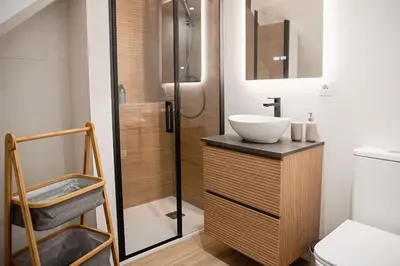 a bathroom with a sink and a shower at Lofts JM Orense D Amplio y cercano a la playa in Valencia