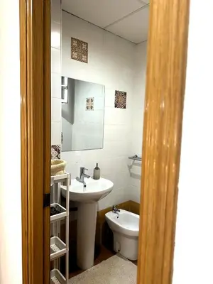 a bathroom with a sink and a toilet at Guillem Silence in Valencia