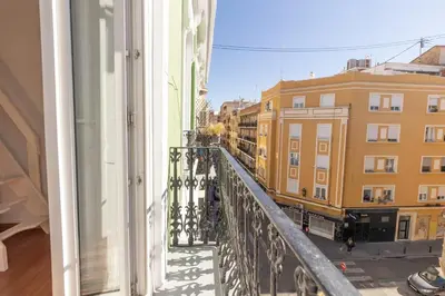 a balcony with a view of a building at GuestReady - Charming stay in the Heart of Russafa in Valencia