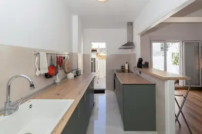 a kitchen with a sink and a counter top at GuestReady - Valencia's Sushine Terrace in Valencia