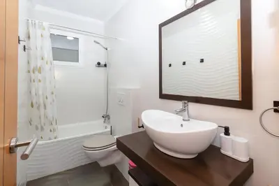 a bathroom with a sink and a toilet and a shower at GuestReady - Valencia's Sushine Terrace in Valencia