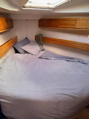 a bedroom with a large bed in a boat at Velero en puerto de valencia in Pinedo