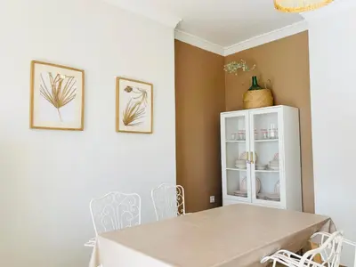 a dining room with a table and chairs at Sun & Sea Cullera in Cullera