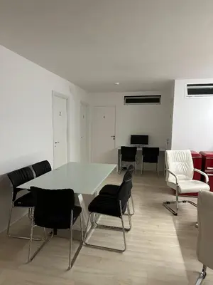 a dining room with a table and chairs at Mi Huésped Valencia, Aeropuerto Manises in Manises